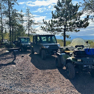ATVs on a trail
