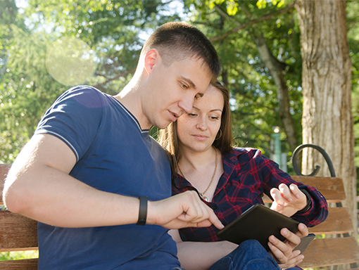 A couple reviewing the bills together
