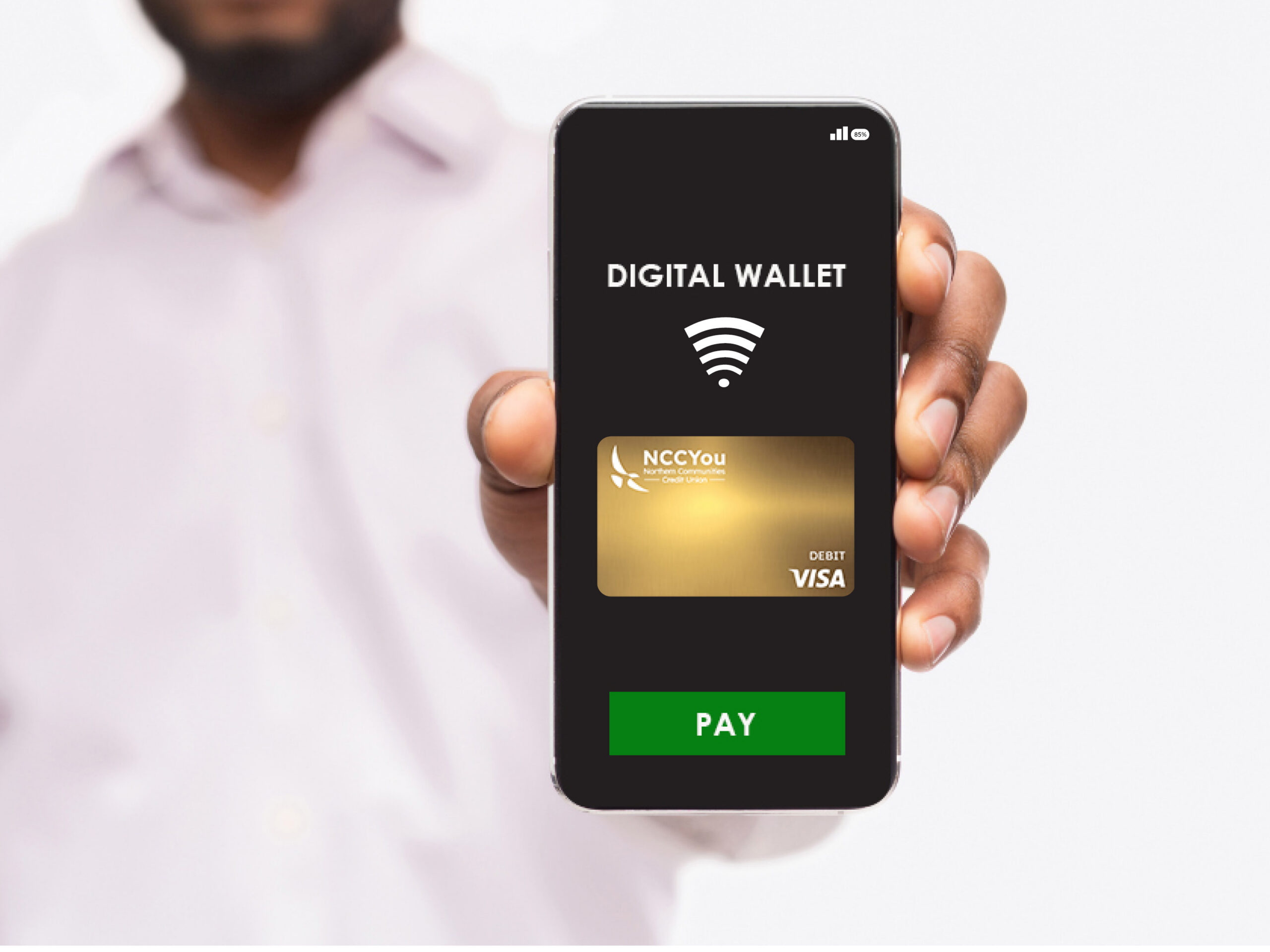 A person holding a phone with an NCCYou mobile wallet on the screen